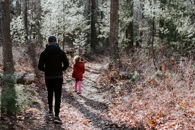 Picture of man and daughter walking in countryside